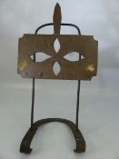 Brass and iron arts and crafts style book stand on horseshoe base