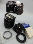 Olympus OM10 Camera with additional lens 50mm, flash gun and filters etc
