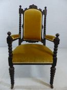 Victorian Armchair with bobbin turned legs and upholstered