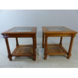 Pair of modern side tables with glass tops and rush shelves