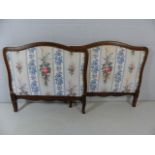 Pair of oak framed single bedheads with floral upholstery