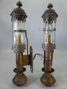 A pair of brass railway wall sconce lights, with applied plaque marked 'GWR' and cylindrical clear