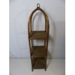 Three tier bent wood plant stand with rush shelves