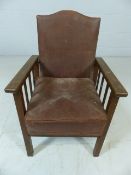 Child's oak framed chair with reclining mechanism