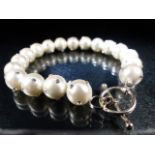 Large freshwater pearl bracelet inset with CZs on silver clasp