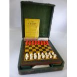 Leather cased compendium of games to include Bridge, drafts and chess