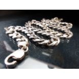 Heavy metal curb link chain with hallmarked silver clasp