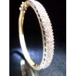 14ct white gold diamond three row pave set diamond hinged bangle