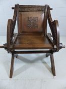 Carved ecclesiastical oak chair