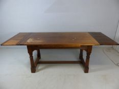 Plank-topped extending refectory table