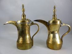Two Turkish brass coffee pots, stamped maker's marks, height approx 33cm