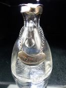 Noggin Glass flask with Hallmarked Silver Lid and collar and a Hallmarked Silver Whiskey plaque on