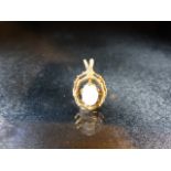 Hallmarked 9ct Gold Pendant set with an Opal
