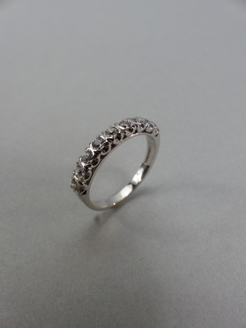 18ct White Gold Half Hoop ET Ring, set with 9 approx: 0.05ct Brilliant cut diamonds. Size approx: ‘ - Image 3 of 4