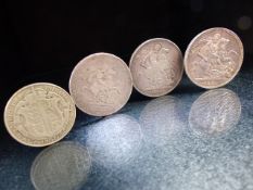 A Silver George III crown, 1819 and Victoria crowns 1888 & 1890 and a George V 1920 half crown.