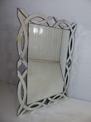 Large contemporary bevelled edge mirror with cut away mirrored frame approx 121cm x 86cm