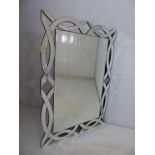 Large contemporary bevelled edge mirror with cut away mirrored frame approx 121cm x 86cm