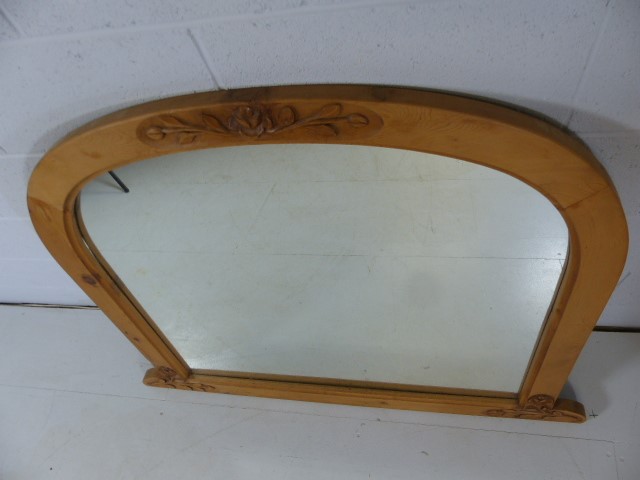 Large pine overmantle mirror with carved floral decoration
