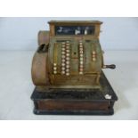 Early 20th Century NATIONAL brass cash register / till with marble base and wooden cash drawer. With