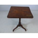 Tilt top occasional table