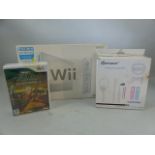 Wii games console, boxed, with accessories kit and three games