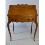 Oak Bureau writing desk with drop leaf on tapered curved elegant Legs and single drawer under