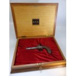 A Percussion cap pocket pistol with engraved decoration signed DEGG London
