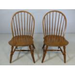 A pair of spindle-backed chairs