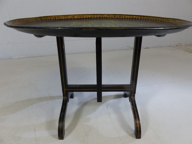 Ebonised Tilt top oval table decorated with flora and forna - Image 5 of 5