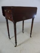 A Victorian mahogany Pembroke table, rectangular top with fall leaves, above two drawer, tapered