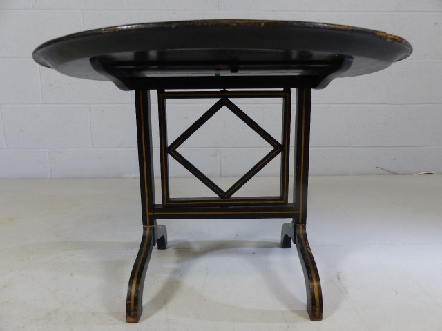 Ebonised Tilt top oval table decorated with flora and forna - Image 2 of 5