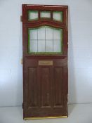 Front door with leaded stained glass windows
