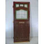 Front door with leaded stained glass windows