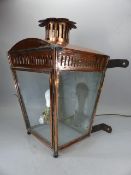 Copper wall mounted, glass-fronted street lamp. Height approx. 52cm