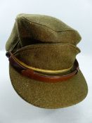 Military interest - Peaked cap, label inside reads EASTERN CAP, PEAKED, WINTER. Size 7 1/8, 1956