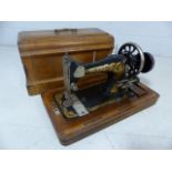 Cased vintage Frister & Rossman sewing machine