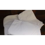 Bag of white bed linen