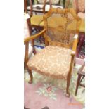 Combed cane backed armchair in mixed woods,
