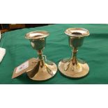 Pair of circular weighted based silver candlesticks (Birmingham 1918)