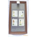 Framed players cigarette card panel of four golfers