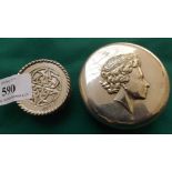 Small decorative plated pill box and another plated larger decorated coins,
