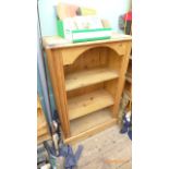 Stripped pine three drawer bookcase