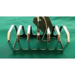 Silver 6 cpt. toast rack (2.