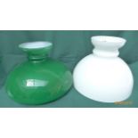 Unused green glass paraffin shade and a clouded glass ditto