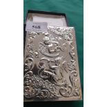 Silver frontal cased (depicting cherubs) copy of The New Testament in original presentation box