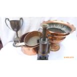 Two graduated oval copper pans,