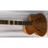 Electro-acoustic jazz guitar with Kent Armstrong pick-up and gold effect hardware