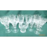 4 Cut glass wine goblets and 12 mixed wines etc each etched with sprays of grapes