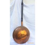 Copper warming pan with turned handle