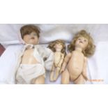 3 pot head dolls,